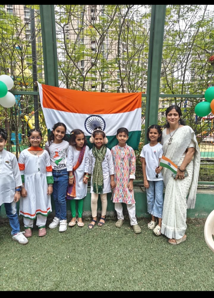 Independence Day celebration with students and Indian flag
